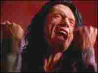 Tommy Wiseau's character confronts his lover. Tommy Wiseau's character confronts his lover.