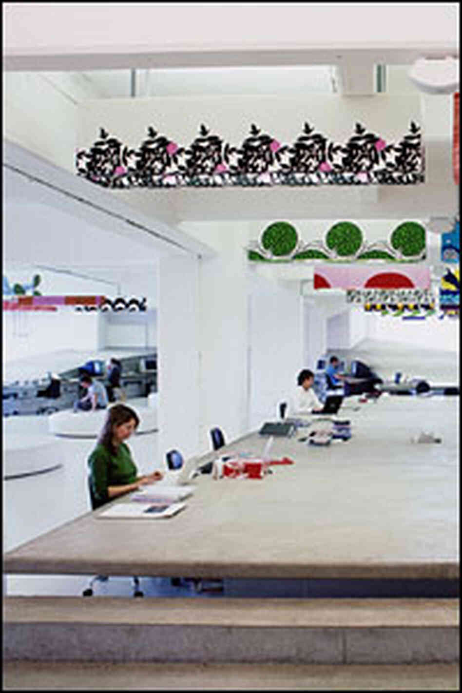 At the London advertising agency Mother, staffers work around a large table.