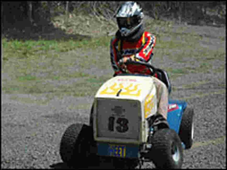 Kirk Frew, a mower-racing enthusiast, gives his mower a test drive. Kirk Frew, a mower-racing enthusiast, gives his mower a test drive.