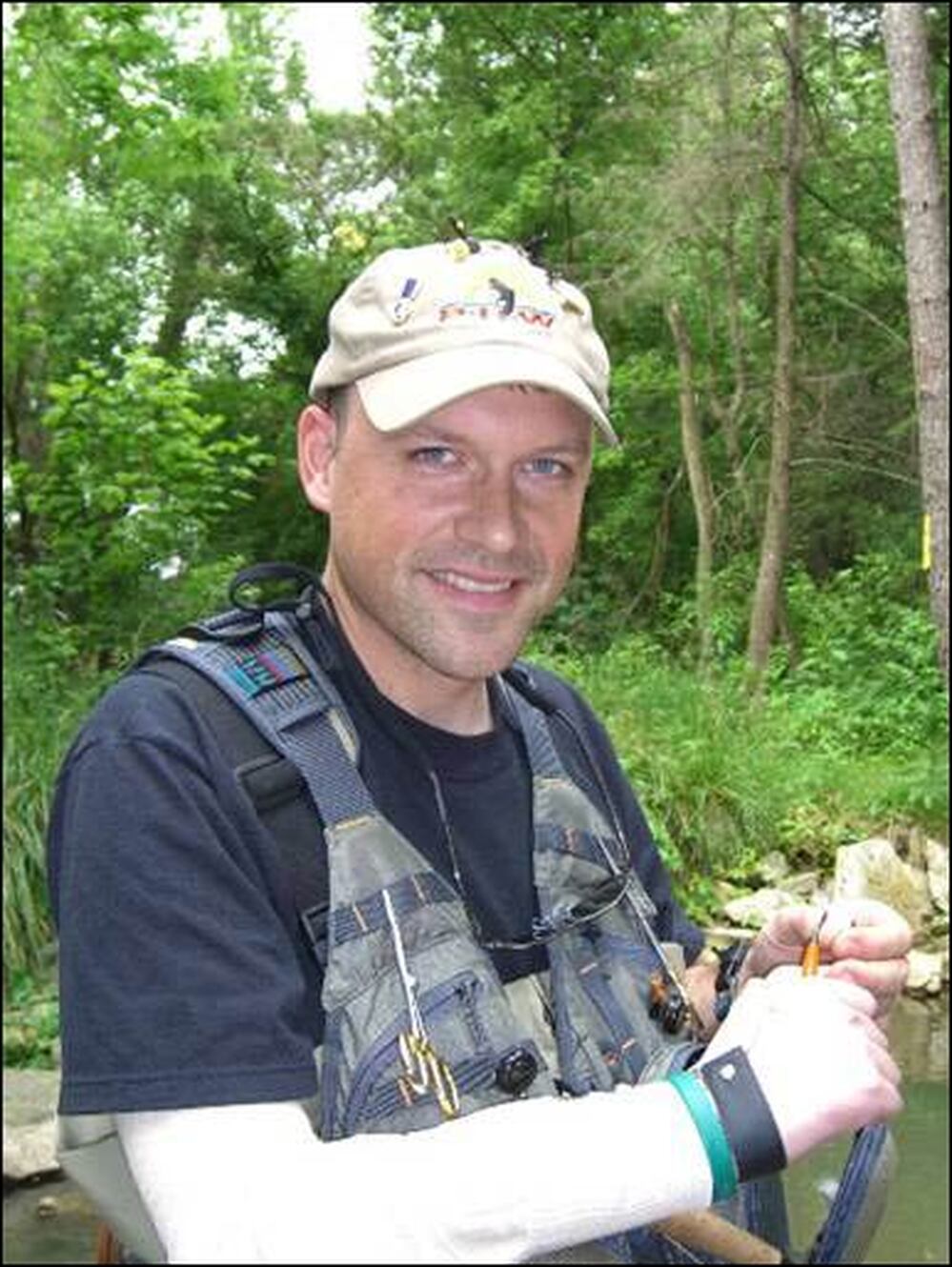 Forseth poses at a Healing Waters outing last year, at Beaver Creek, near Hagerstown, Md.