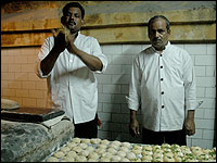 Kitchen workers in the Indian city of Lucknow prepare dough for making Indian flatbread, called naan.  Lucknow is famous for its opulent feasts.