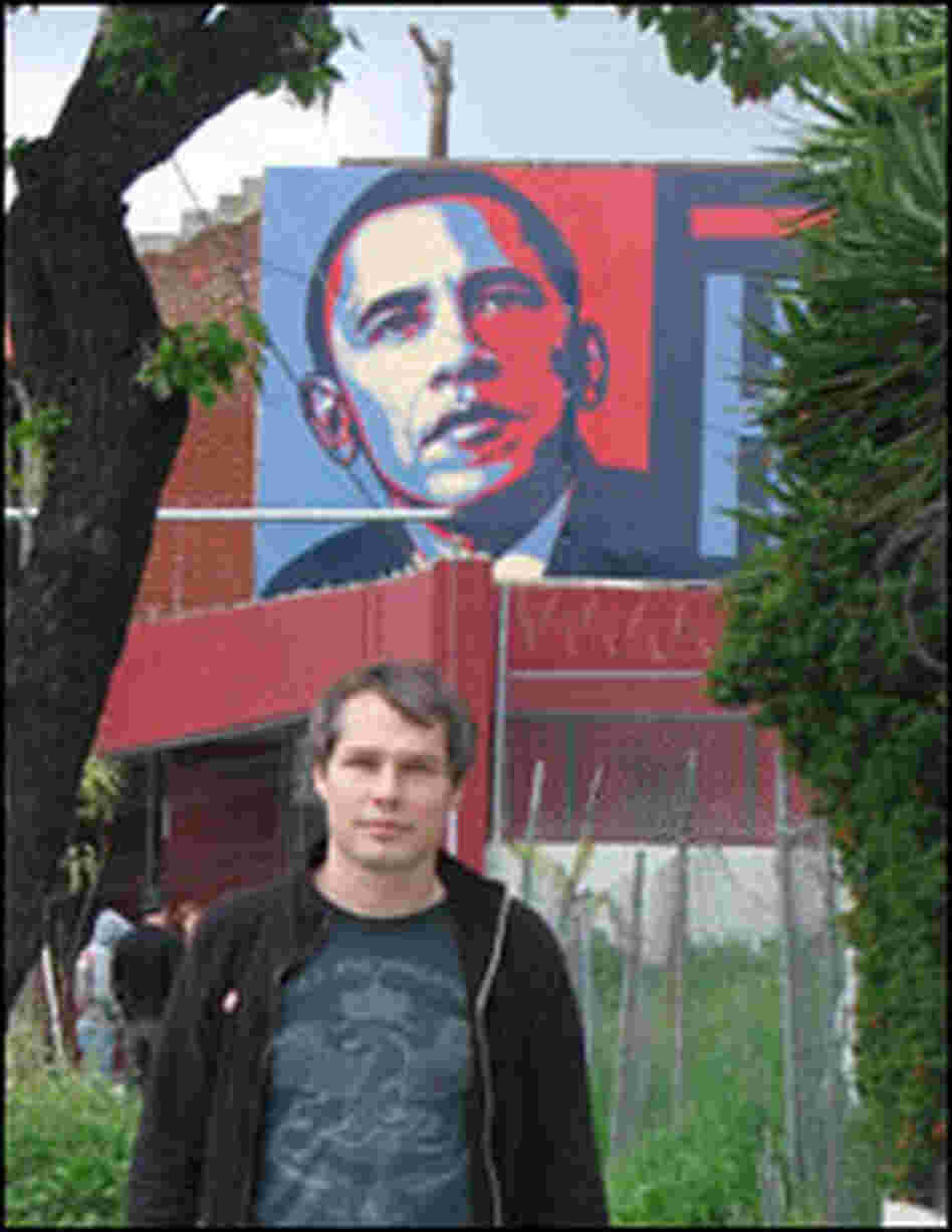 Shepard Fairey with his poster Shepard Fairey with his poster
