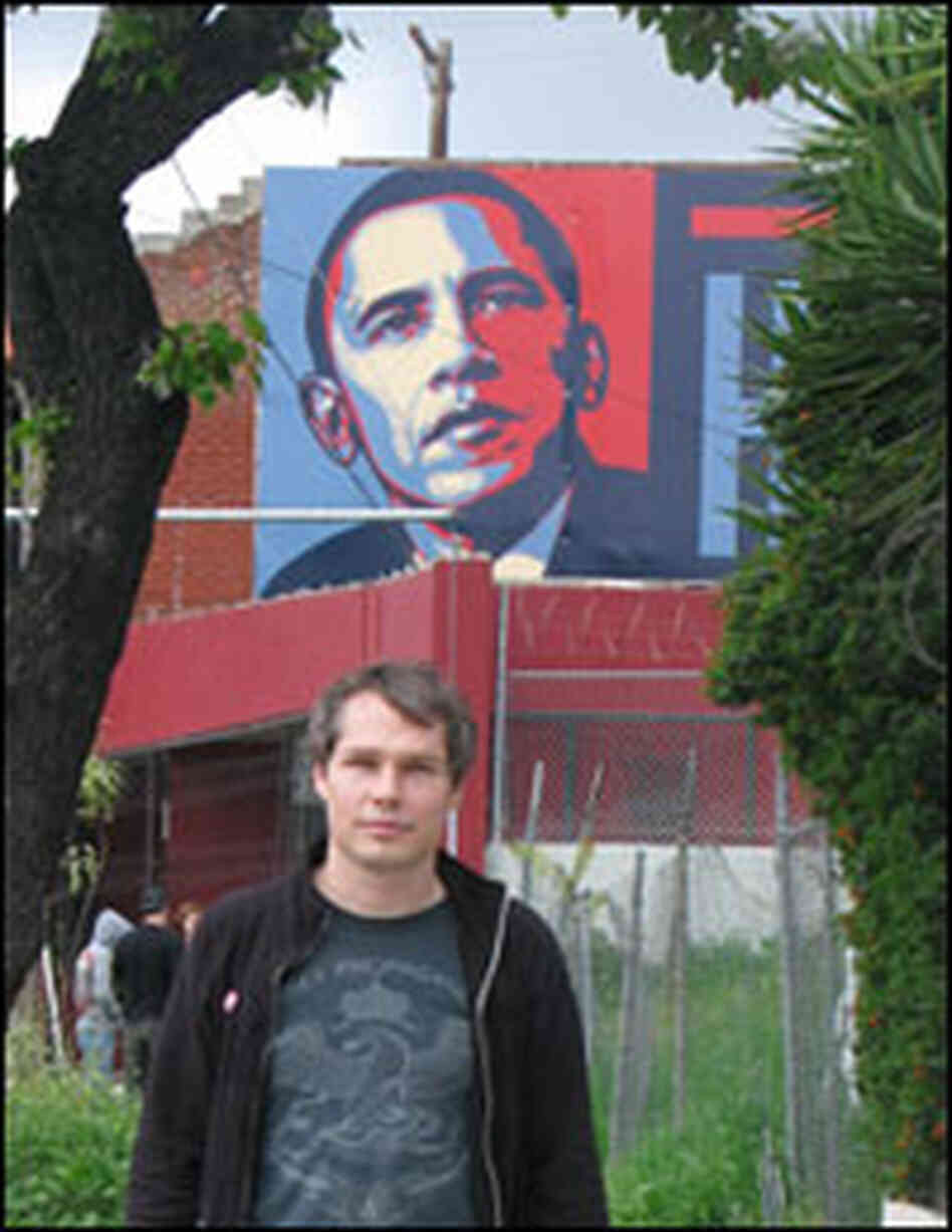 Shepard Fairey with his poster Shepard Fairey with his poster