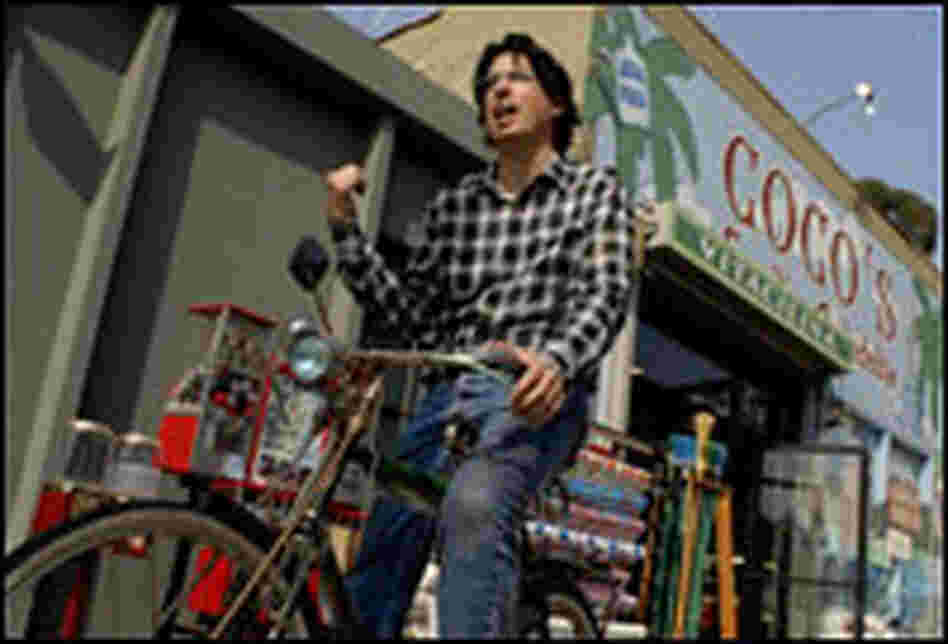 Mr. Jalopy on a bicycle