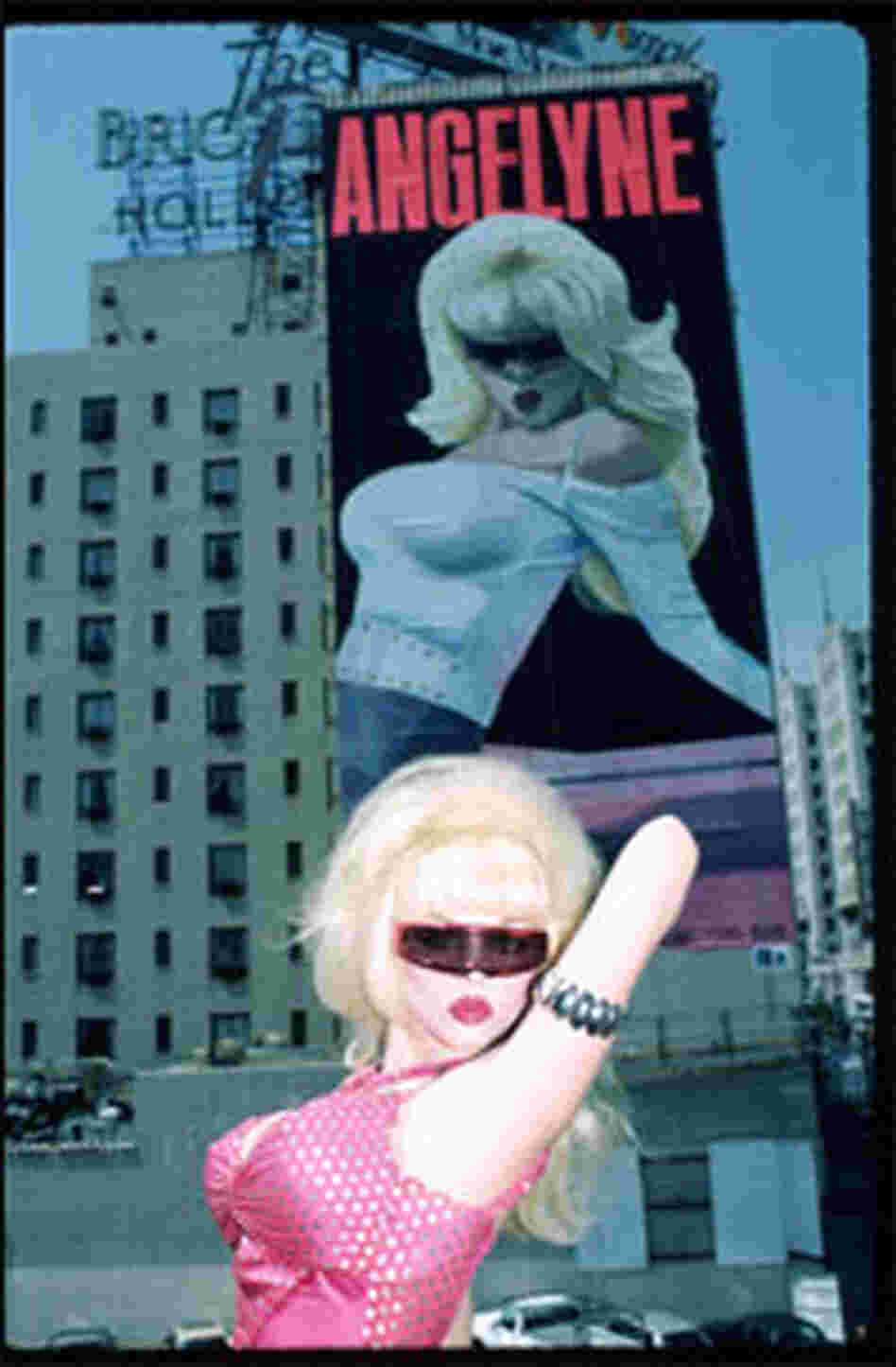 Angelyne poses with billboard in 1987 Angelyne poses with billboard in 1987