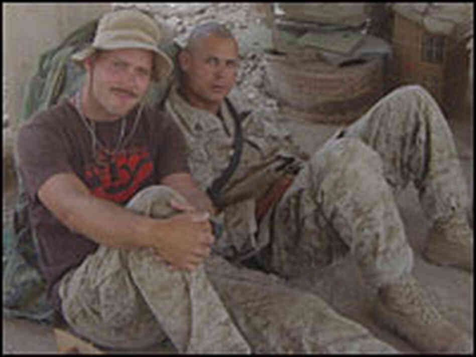 Evan Wright and Sgt. Antonio J. Espera kill time Evan Wright and Sgt. Antonio J. Espera kill time