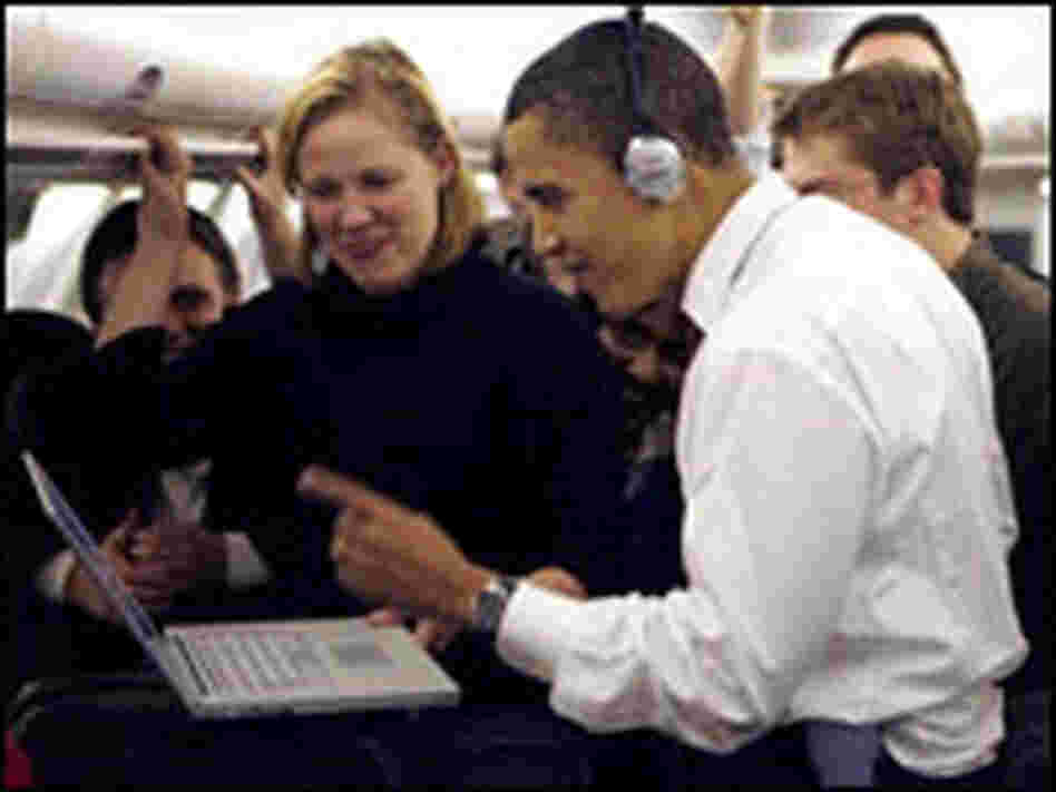 Barack Obama watches a rally video on a laptop in February. Barack Obama watches a rally video on a laptop in February.