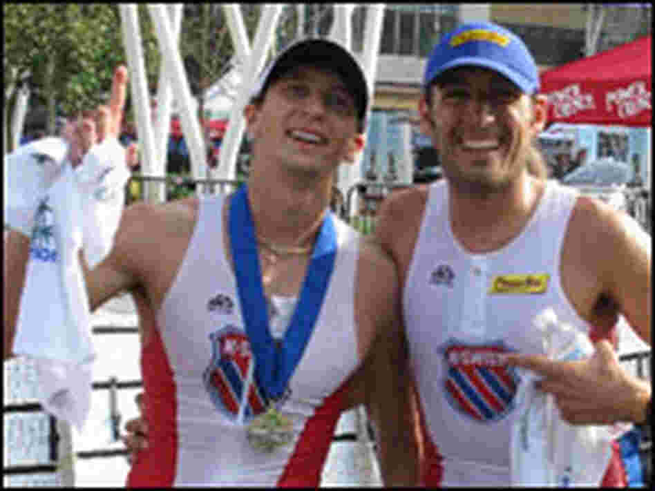 Athlete and training guide celebrate successful triathlon. Athlete and training guide celebrate successful triathlon.