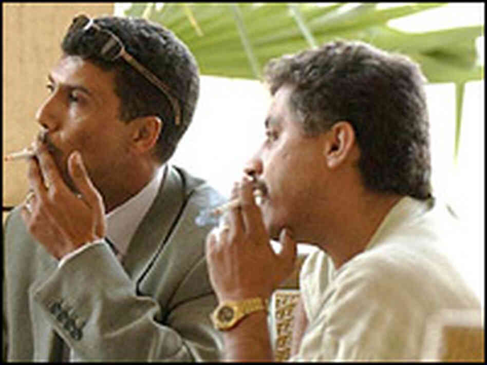 Ali Kamel al-Nadi, left, and Amin Mansour Ali Kamel al-Nadi, left, and Amin Mansour