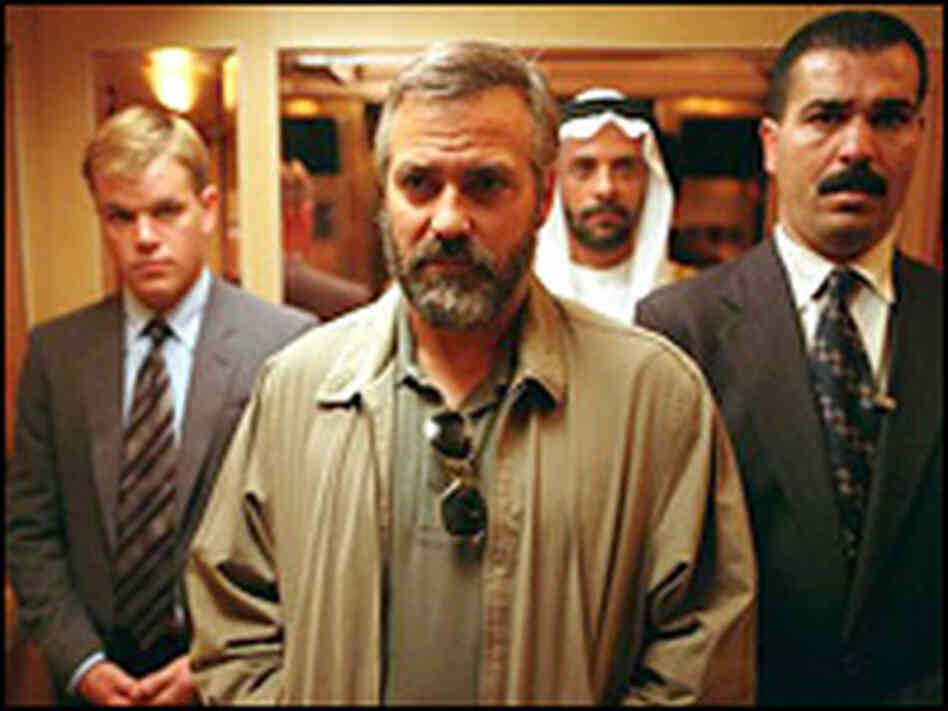 Matt Damon, left, and George Clooney, center, in 'Syriana' Matt Damon, left, and George Clooney, center, in 'Syriana'