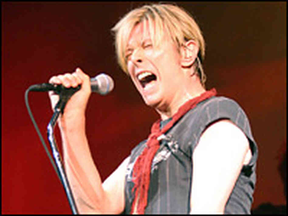 David Bowie in a live show from 2003. David Bowie in a live show from 2003.