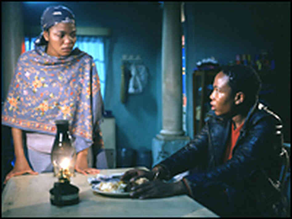 Presley Chweneyagae is Tsotsi, right, along with Terry Pheto as Zola. Presley Chweneyagae is Tsotsi, right, along with Terry Pheto as Zola.