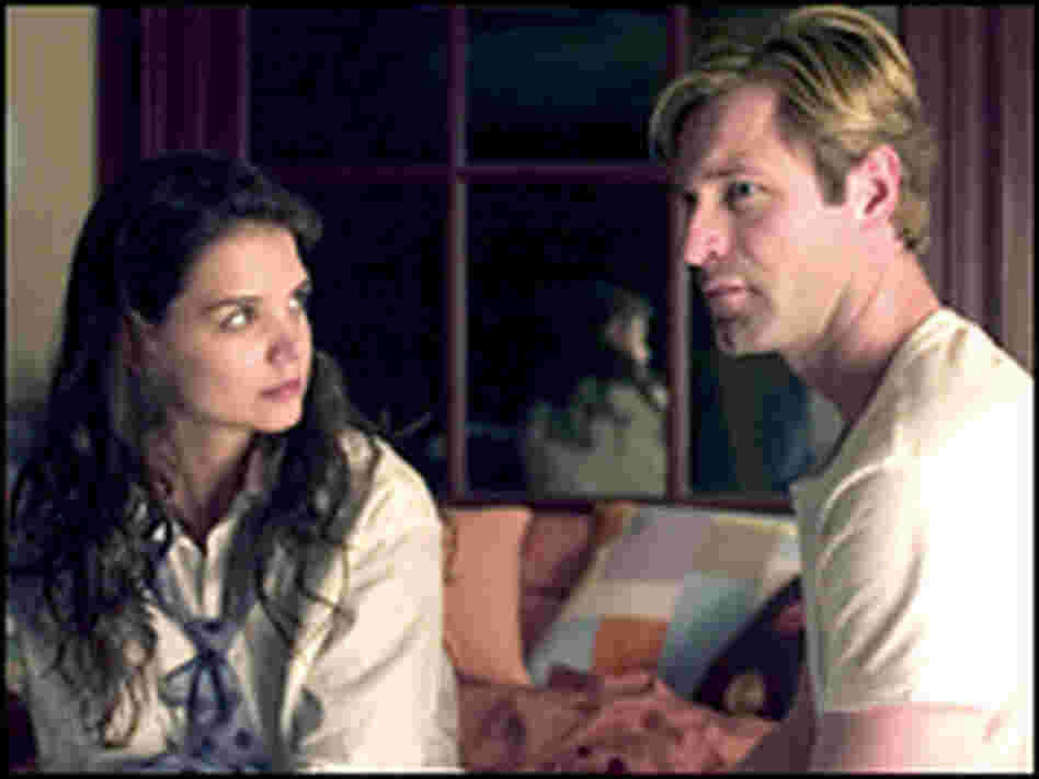 Katie Holmes as a reporter, left, and Aaron Eckhart as Nick Naylor. Katie Holmes as a reporter, left, and Aaron Eckhart as Nick Naylor.