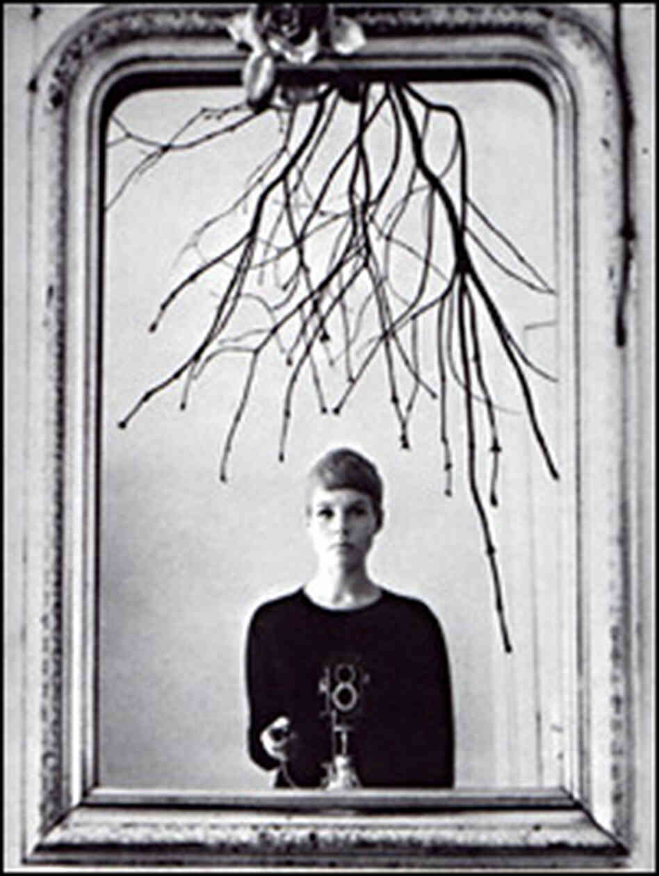 Astrid Kirchherr, shooting a self-portrait in the mirror Astrid Kirchherr, shooting a self-portrait in the mirror
