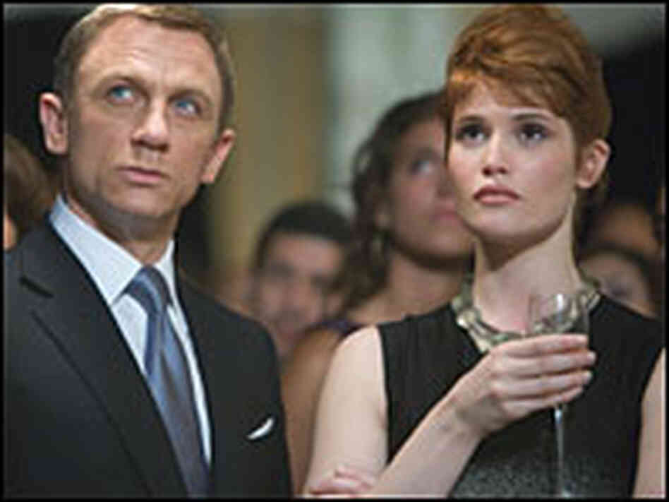 Daniel Craig as James Bond and Gemma Arterton as Strawberry Fields Daniel Craig as James Bond and Gemma Arterton as Strawberry Fields
