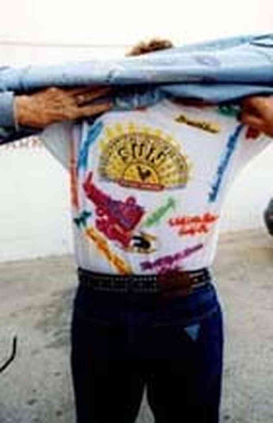 Sam Phillips shows off his Sun Studio T-shirt in Memphis in 1999. Sam Phillips shows off his Sun Studio T-shirt in Memphis in 1999.