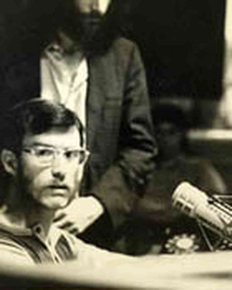 Ken Sleeman, the manager of WGTB-FM in the 1970s, seated at a microphone. Ken Sleeman, the manager of WGTB-FM in the 1970s, seated at a microphone.