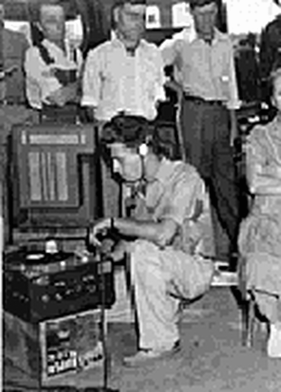 Charles Todd recording on his bulky Presto machine. Charles Todd recording on his bulky Presto machine.