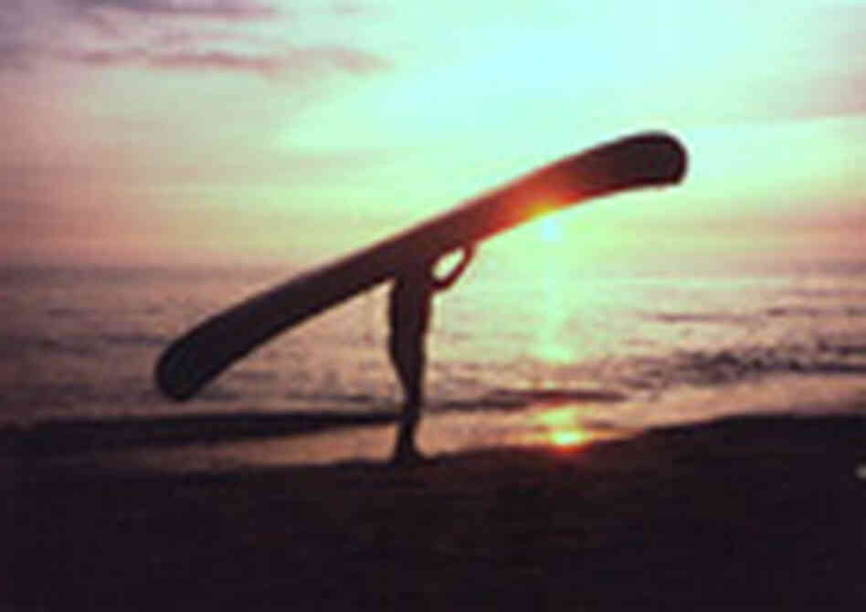 Grandpa Jim carrying a canoe over his head Grandpa Jim carrying a canoe over his head
