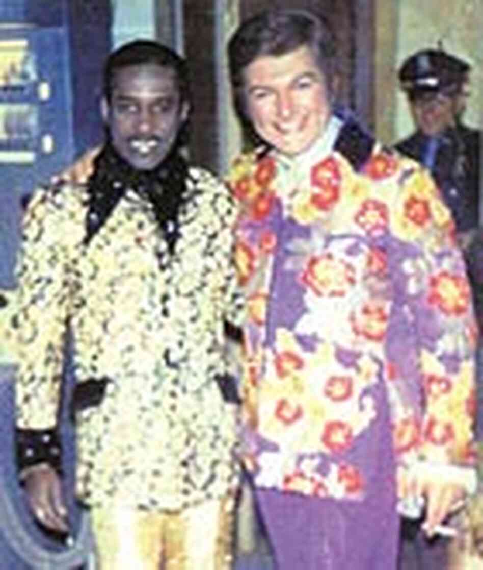 Hugh Borde, leader of the Esso Trinidad Tripoli Steelband, and Liberace, circa 1970. Hugh Borde, leader of the Esso Trinidad Tripoli Steelband, and Liberace, circa 1970.