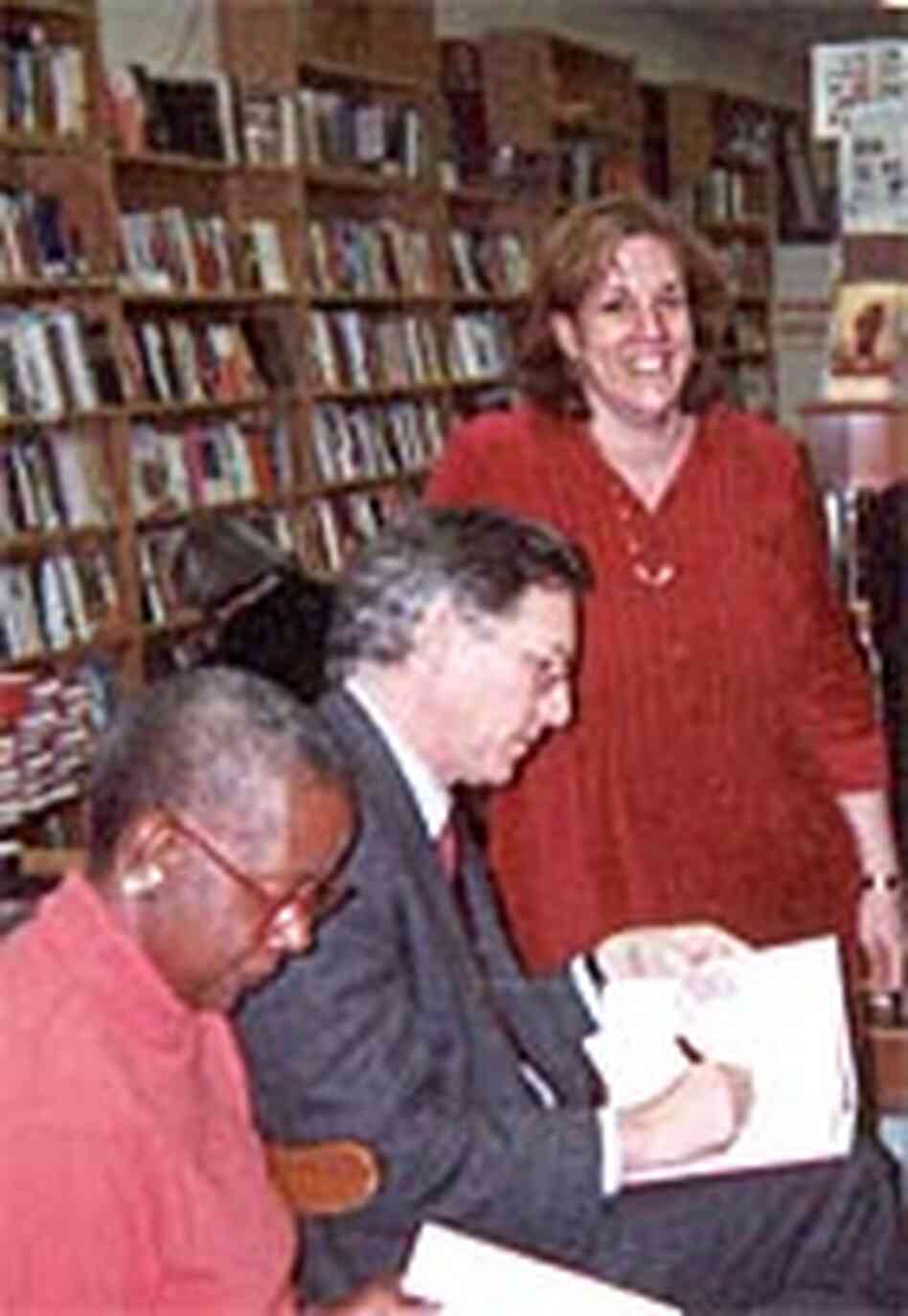 Rona Brinlee, standing, with authors Dorothy J. Gaiter and John Brecher at the Book Mark. Rona Brinlee, standing, with authors Dorothy J. Gaiter and John Brecher at the Book Mark.