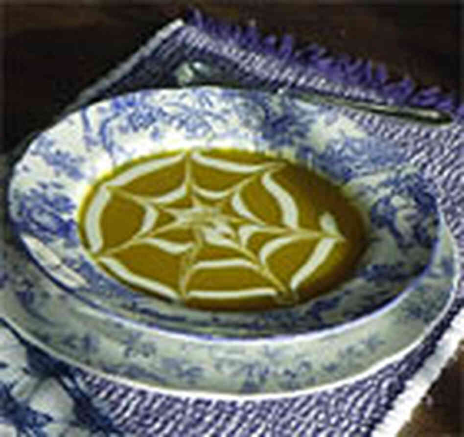 Soup highlighted with a swirl of sour cream Soup highlighted with a swirl of sour cream