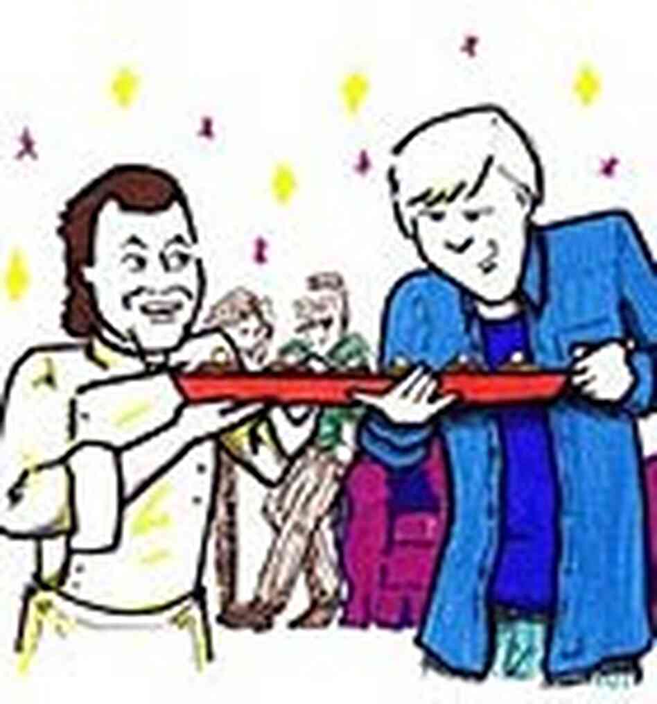 Wolfgang Puck presents his smoked salmon dish to Bob. Wolfgang Puck presents his smoked salmon dish to Bob.