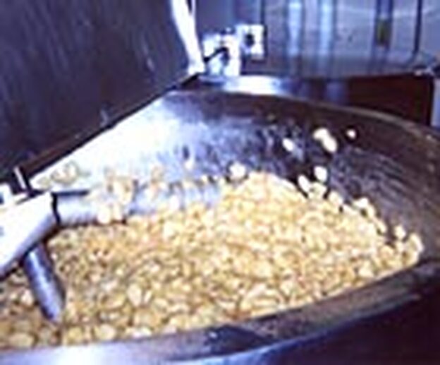 A 2,000-pound vat of spiced apples is prepared for an MRE.