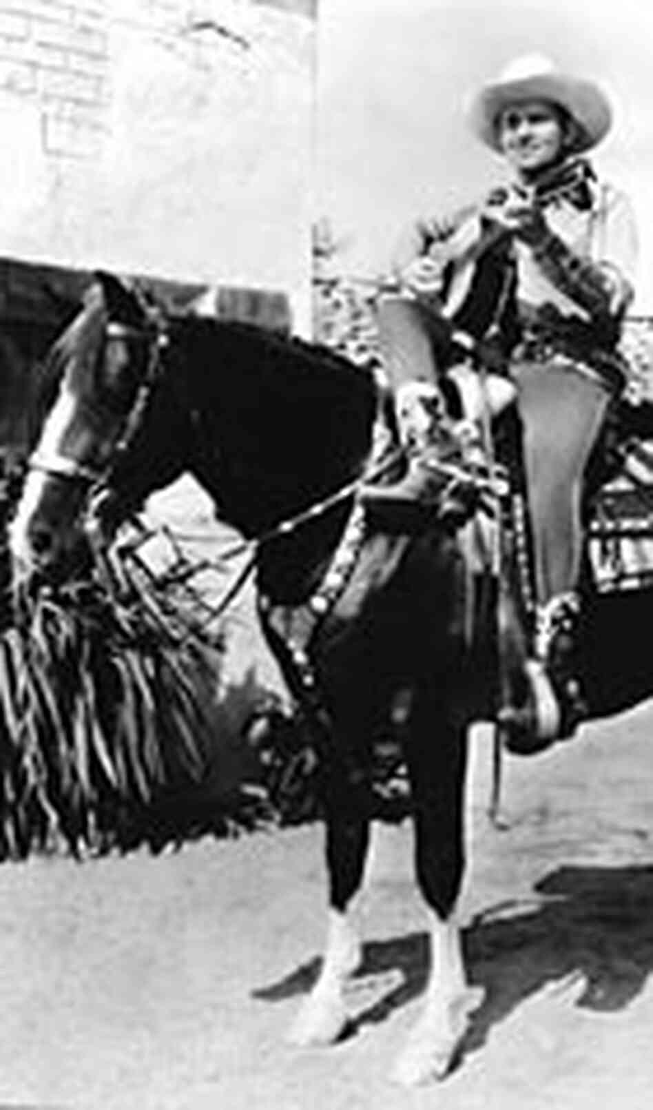 Gene Autry with his horse, Champion Gene Autry with his horse, Champion