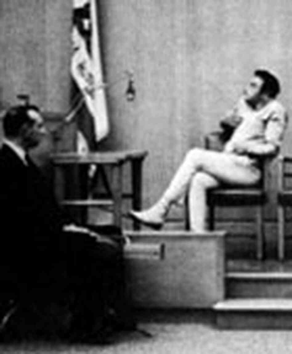Lenny Bruce takes the stand in court. Lenny Bruce takes the stand in court.