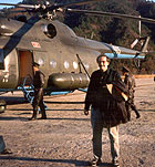Alvarez in front of a North Korean helicopter.