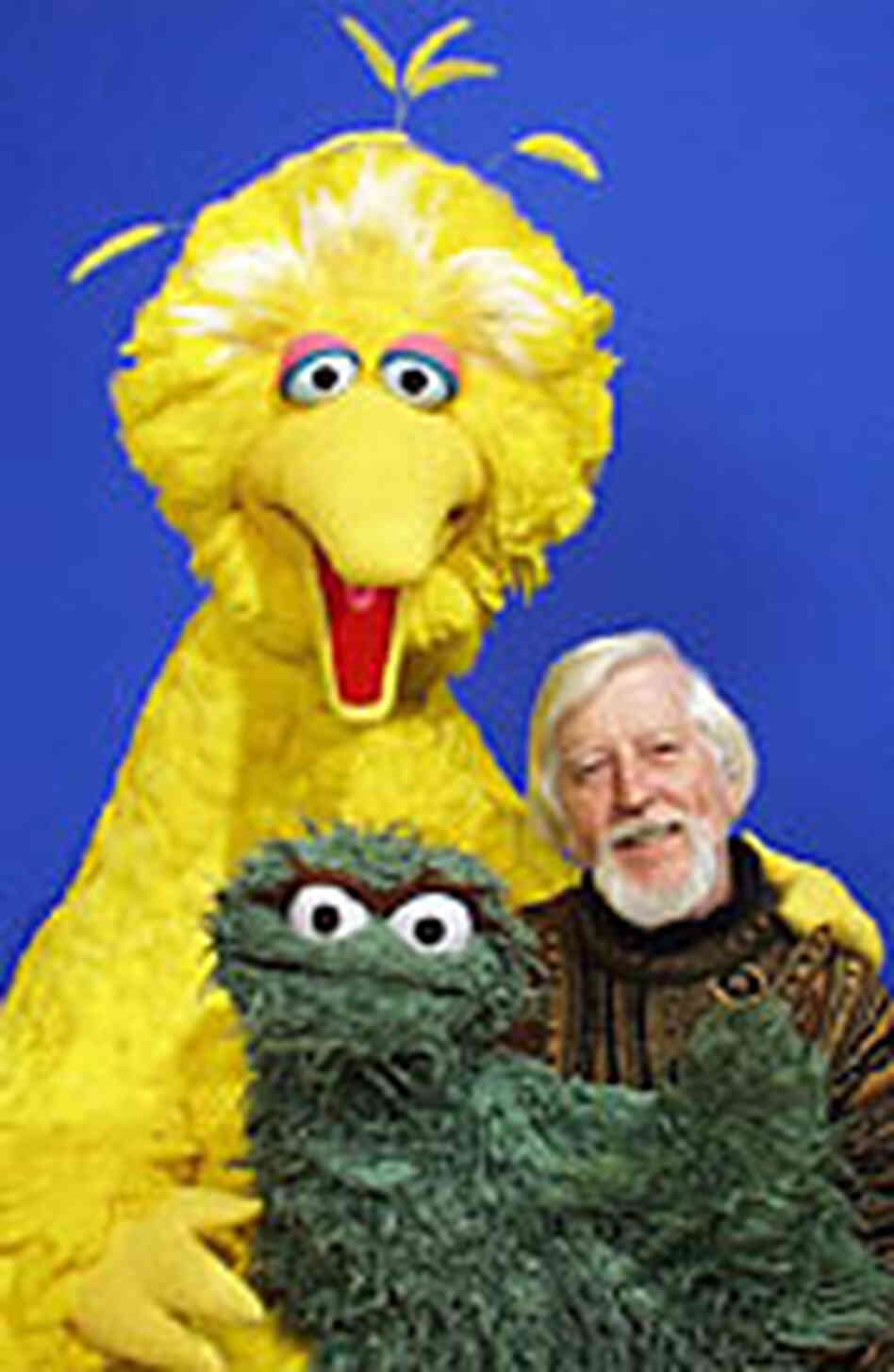 Caroll Spinney, with Big Bird and Oscar the Grouch costumes. Caroll Spinney, with Big Bird and Oscar the Grouch costumes.