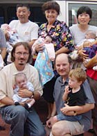 Tim Baker, John Bentley and other aid workers, with orphans.