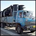 Rob Gifford hitches a ride with a truck driver across the Gobi Desert; Photo: Liang Yan for NPR