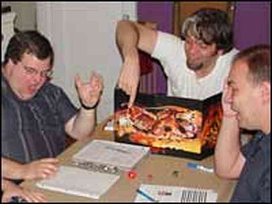D and D players at Peter Girvan's house in the Bronx recoil in mock horror at a bad roll of the dice D and D players at Peter Girvan's house in the Bronx recoil in mock horror at a bad roll of the dice