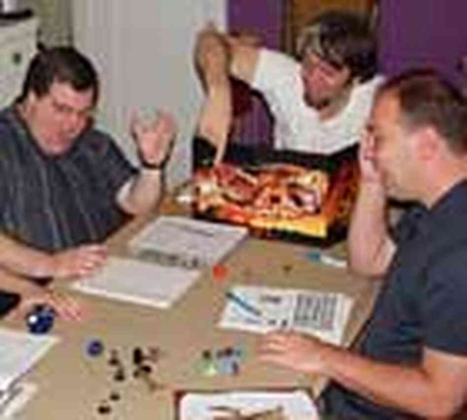 D and D players at Peter Girvan's house in the Bronx recoil in mock horror at a bad roll of the dice D and D players at Peter Girvan's house in the Bronx recoil in mock horror at a bad roll of the dice