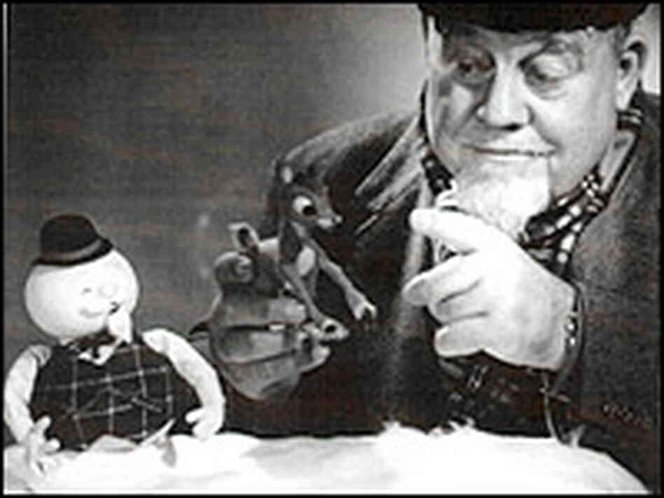 Singer Burl Ives with figures Sam and Rudolph. Singer Burl Ives with figures Sam and Rudolph.