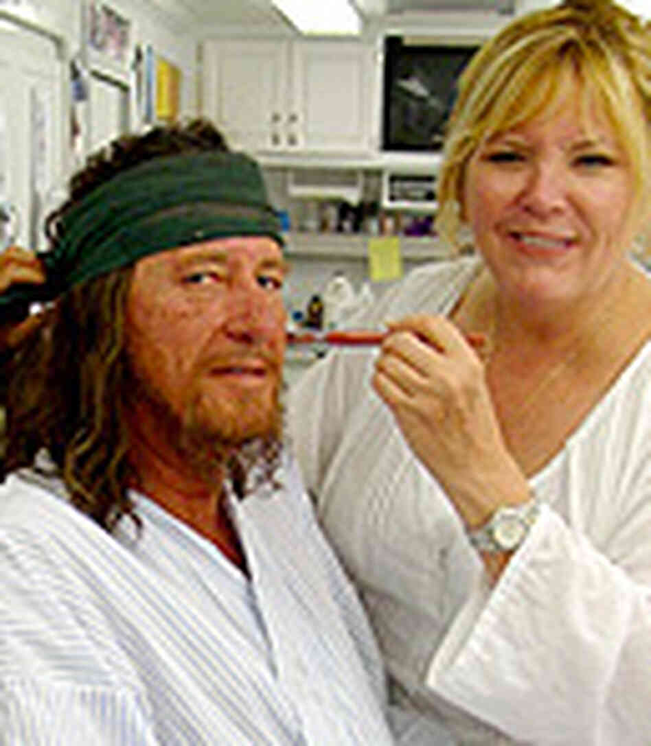 Ve Neill applies makeup to actor Geoffrey Rush Ve Neill applies makeup to actor Geoffrey Rush
