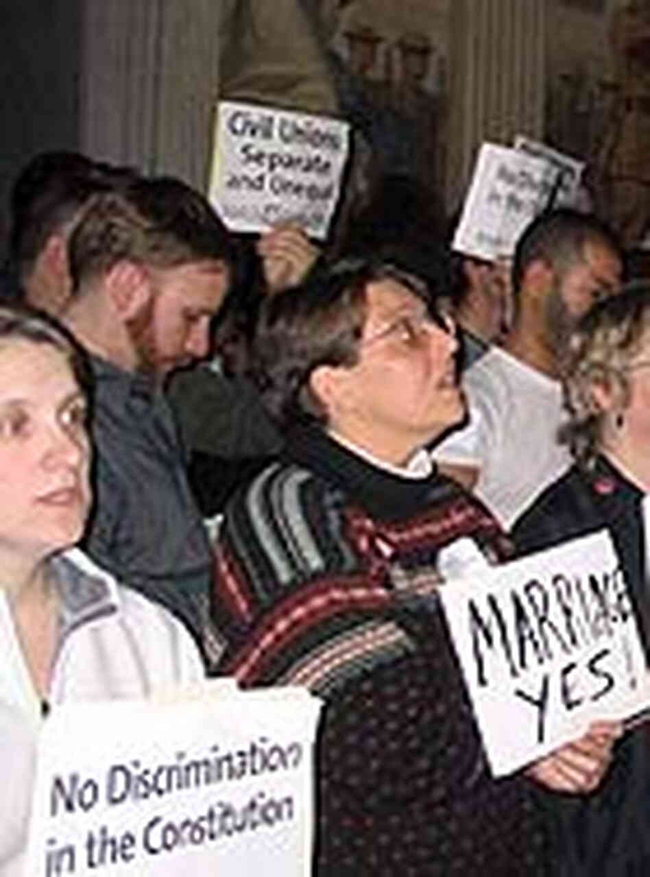 Gay rights activists crowd the Massachusetts statehouse. Gay rights activists crowd the Massachusetts statehouse.