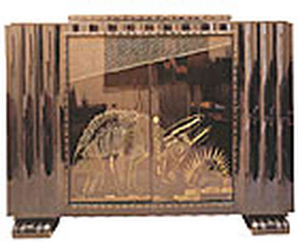 A 1925 French black lacquer cabinet. A 1925 French black lacquer cabinet.