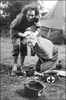 Fellow combat nurse Laura Ball washes Kate Nolan's hair at a field hospital in France in September 1944.