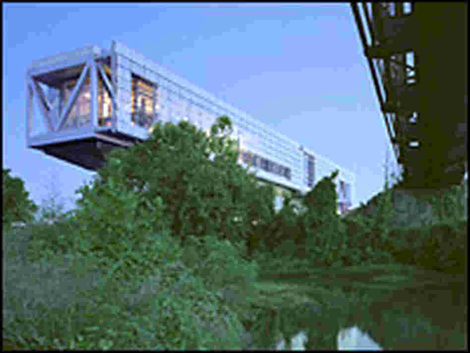 The design of the Clinton Library is meant to evoke a bridge. Credit: Clinton Foundation The design of the Clinton Library is meant to evoke a bridge. Credit: Clinton Foundation
