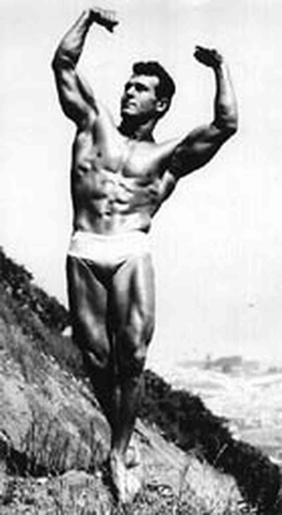 Jack La Lanne strikes a muscular pose. Jack La Lanne strikes a muscular pose.
