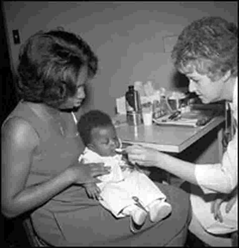 An infant receives the oral polio vaccine in Georgia in the 1970s. An infant receives the oral polio vaccine in Georgia in the 1970s.
