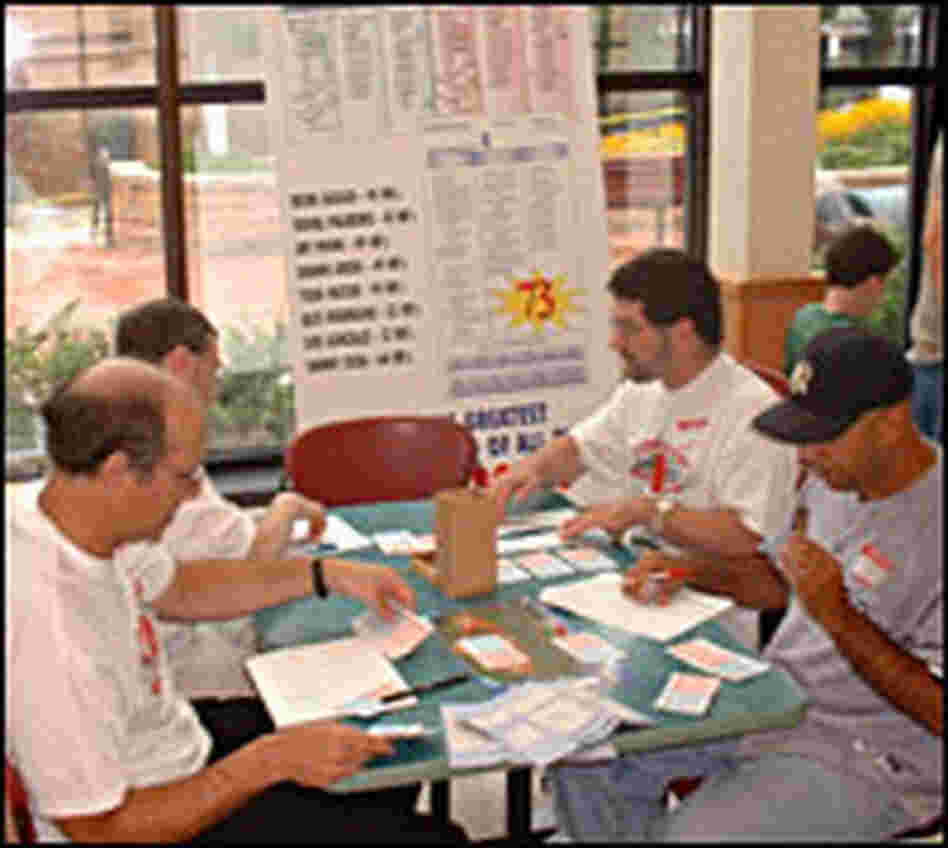 Fans play Strat-O-Matic during a 40th anniversary tournament. Fans play Strat-O-Matic during a 40th anniversary tournament.