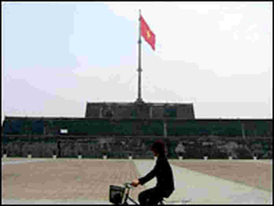 A Vietnamese flag flies over the citadel of the old imperial city in Hue.