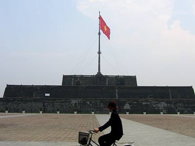 A Vietnamese flag flies over the citadel of the old imperial city in Hue.