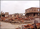 A damaged building in Odioma. Credit: Jim Wallace. A damaged building in Odioma. Credit: Jim Wallace.
