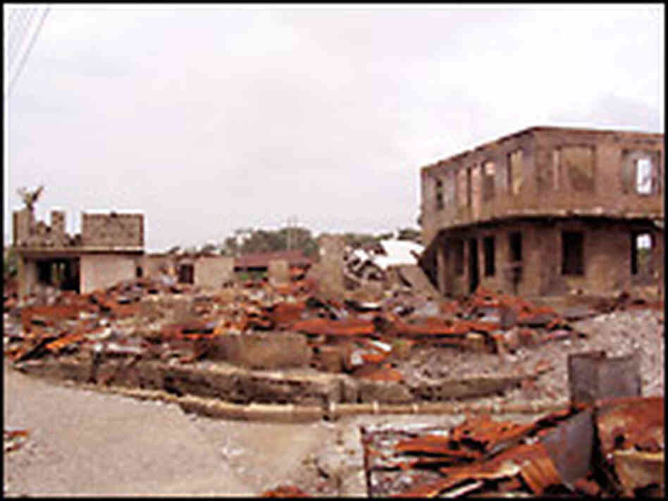 A damaged building in Odioma. Credit: Jim Wallace. A damaged building in Odioma. Credit: Jim Wallace.