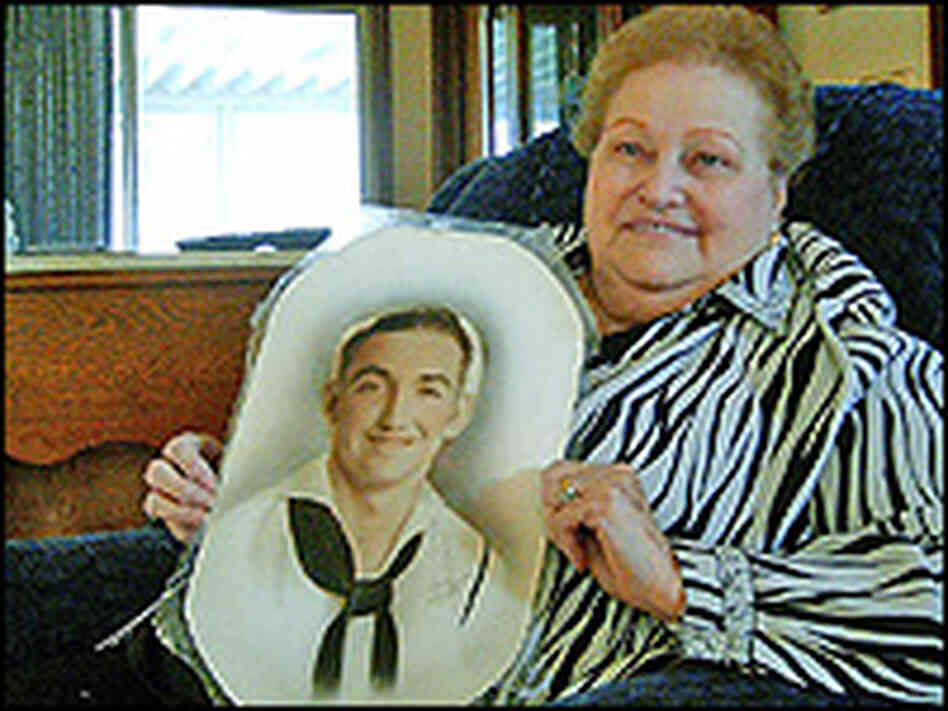 Thelma Blanton of Kansas City, Kan., holds a picture of her late brother Payton L. Vanderpool Thelma Blanton of Kansas City, Kan., holds a picture of her late brother Payton L. Vanderpool